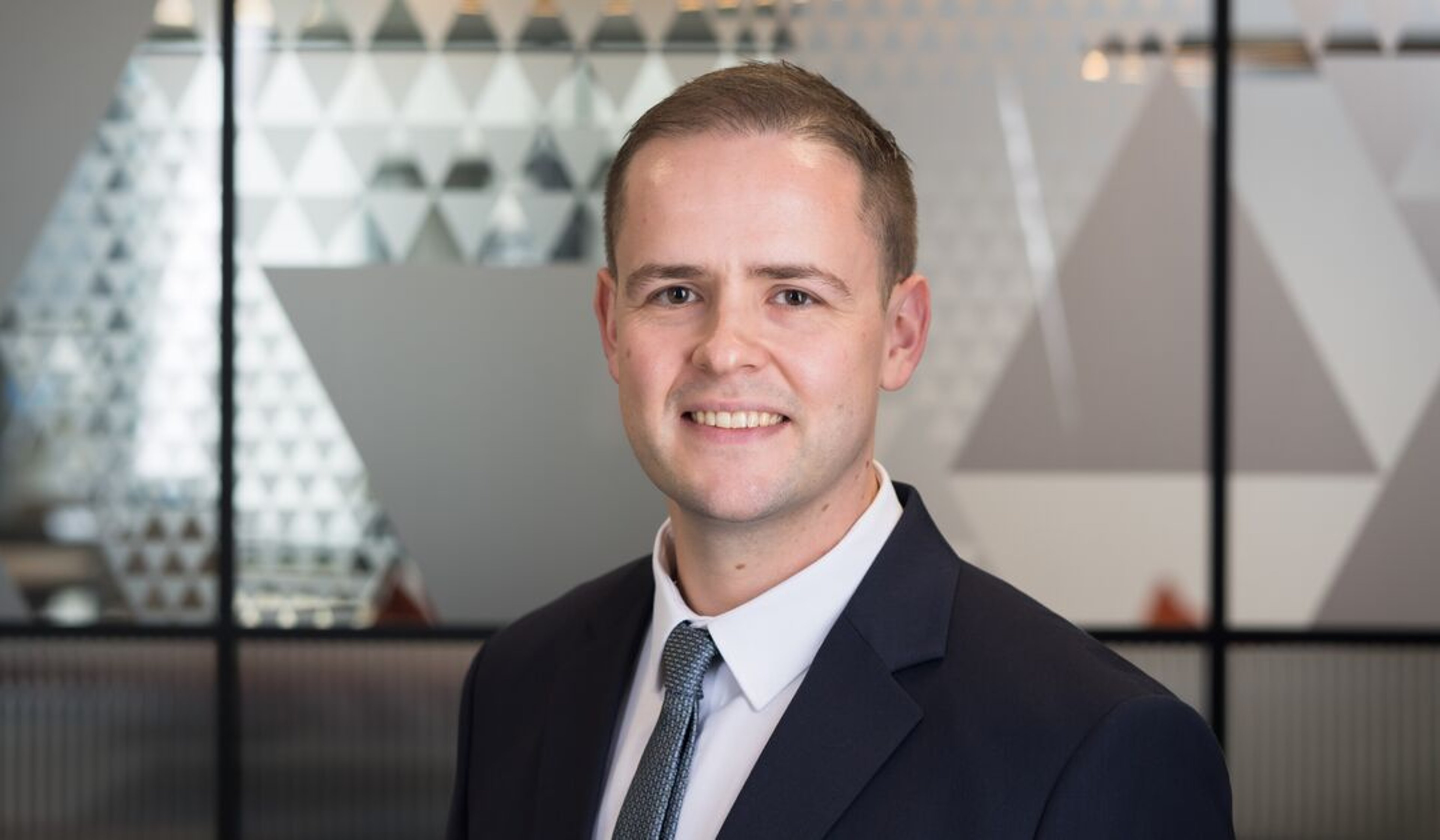 A headshot of John Kean