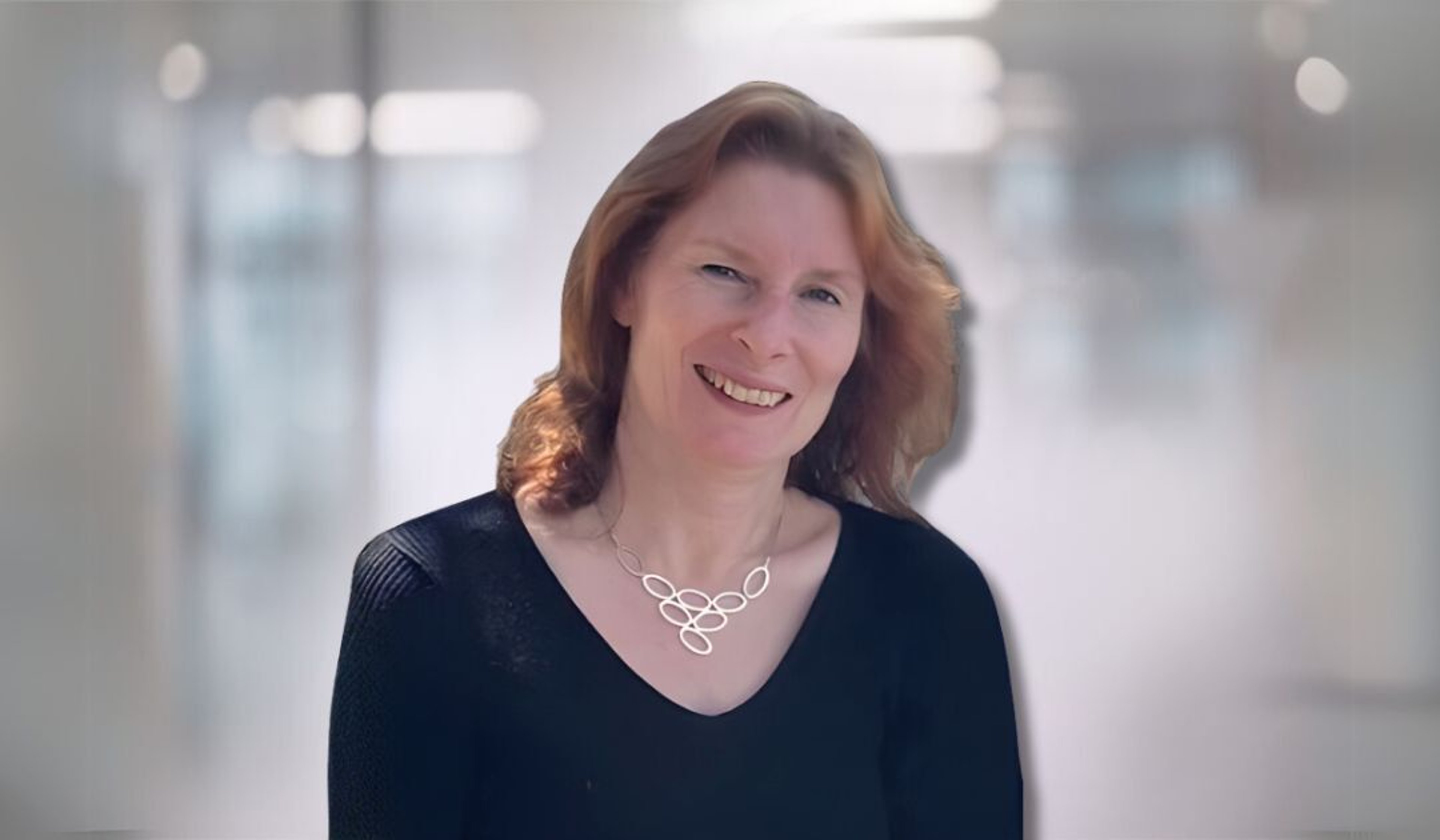 A headshot of Debi Allen