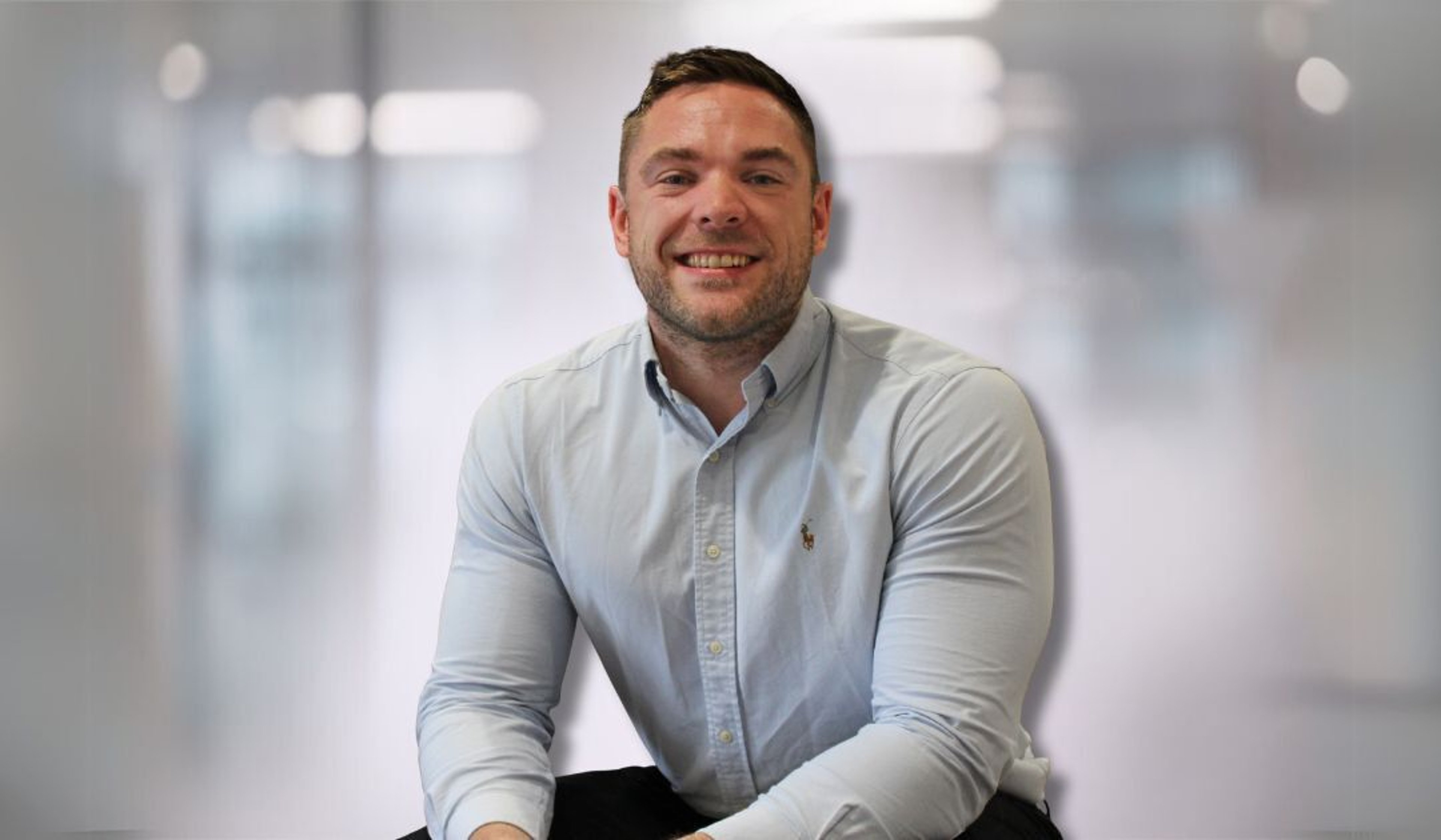 A headshot of Lewis Aldridge