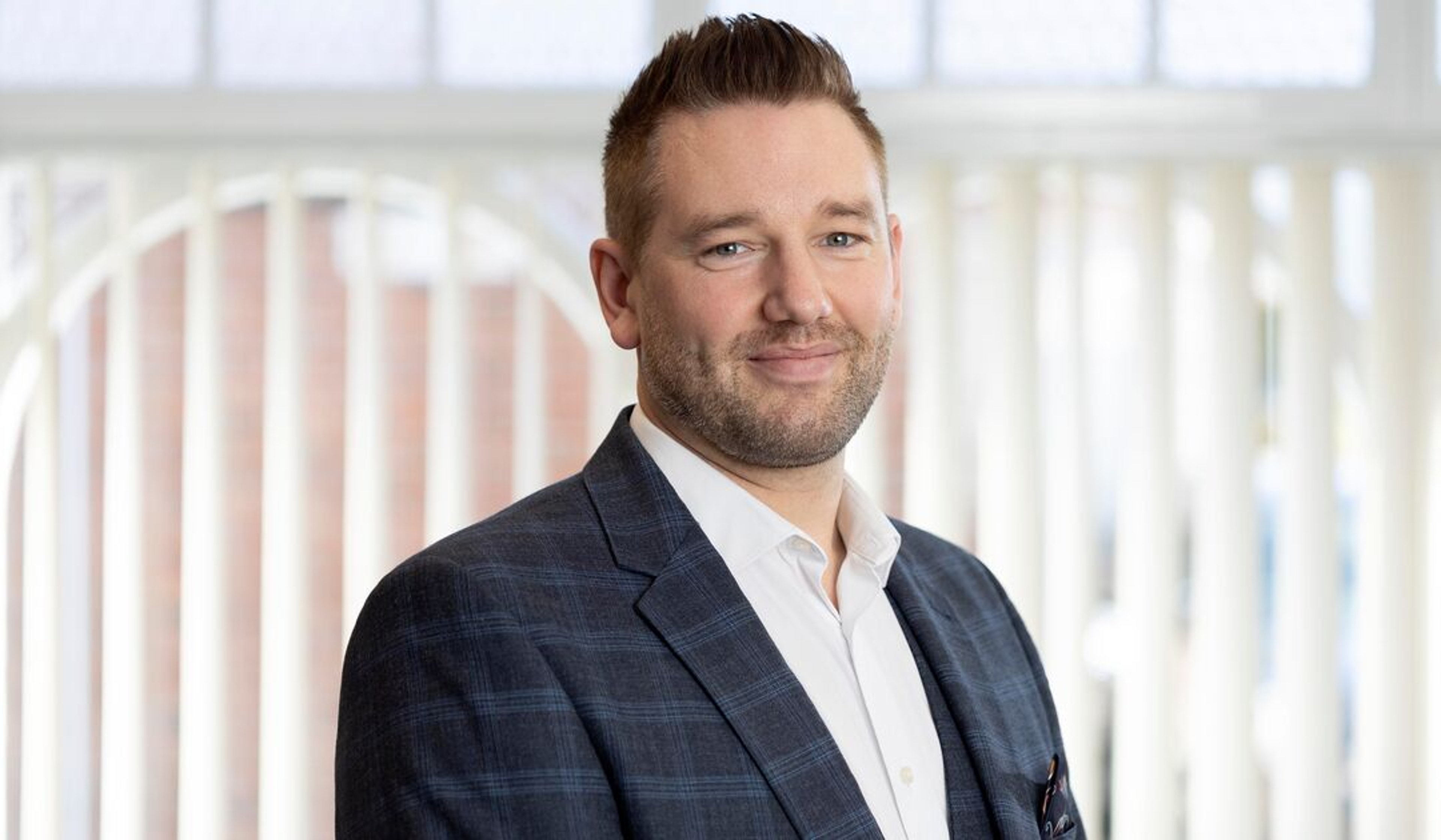 A headshot of Luke Wheal