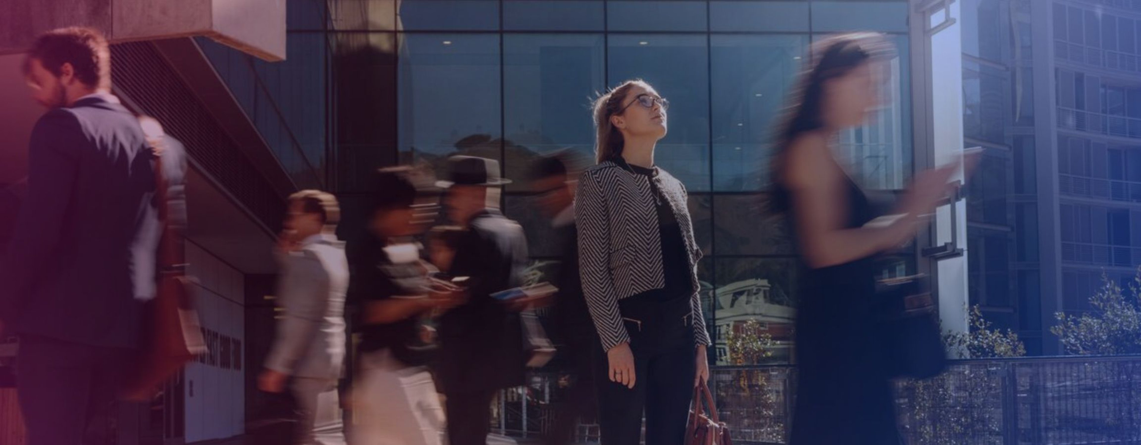 Employees walking in and out of the office